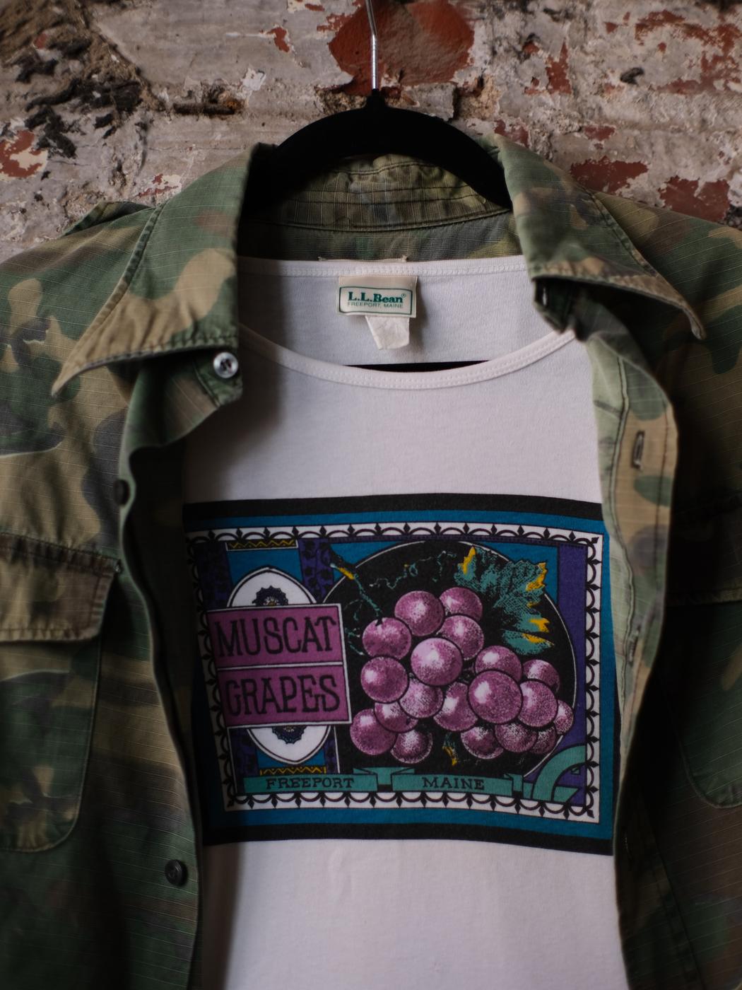 A 1970s ripstop camouflage shirt layered over a 1980s L.L. Bean muscat grapes print tee